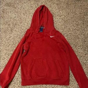 red nike hoodie with a slit